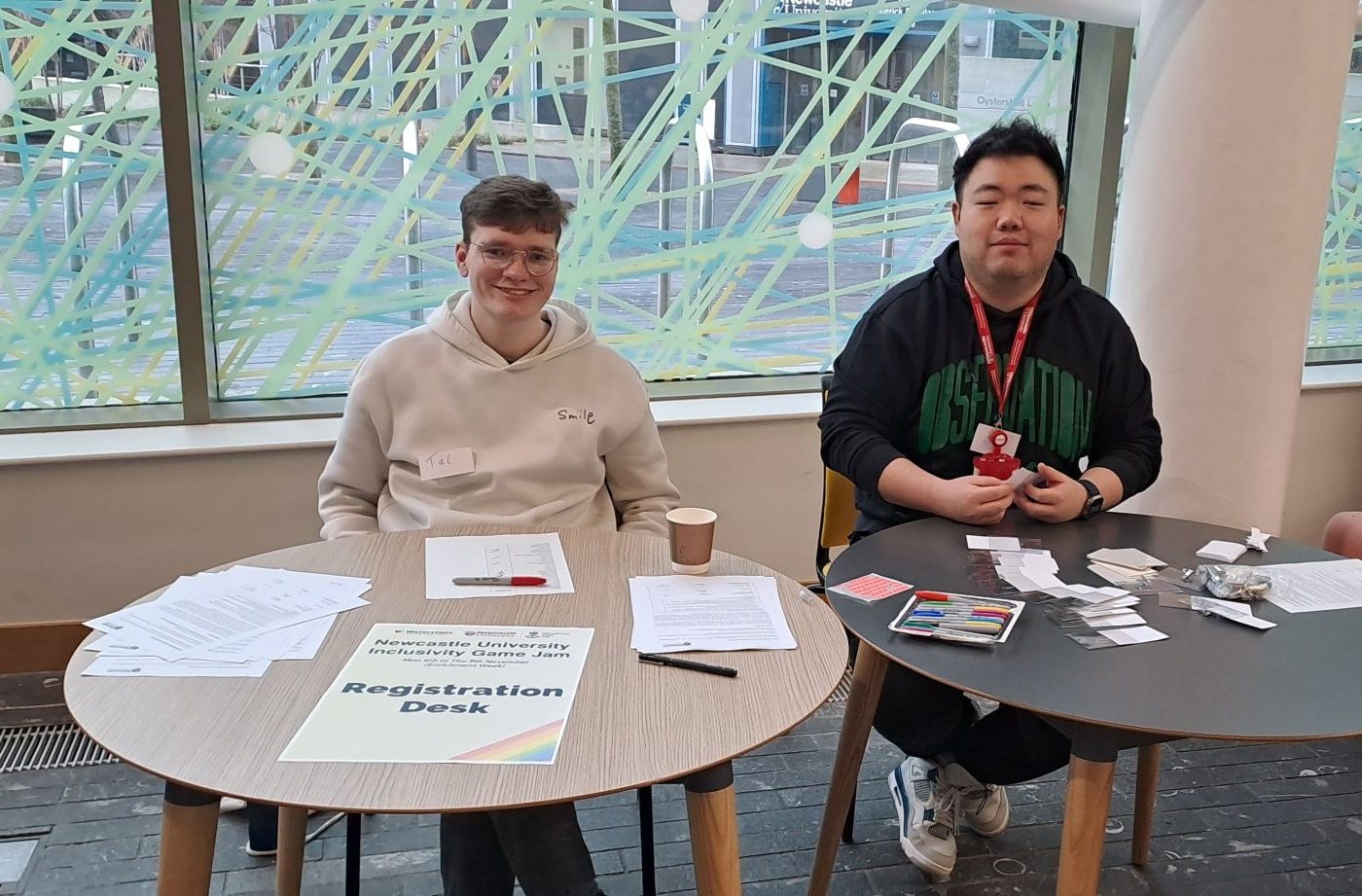 Me running the registration desk at Newcastle University's Inclusivity Game Jam
